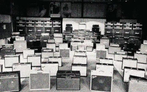 A picture of loads of guitar amps