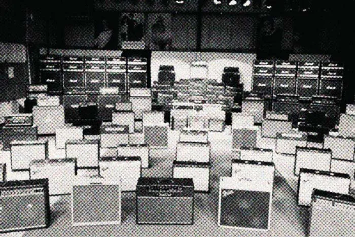 A picture of loads of guitar amps