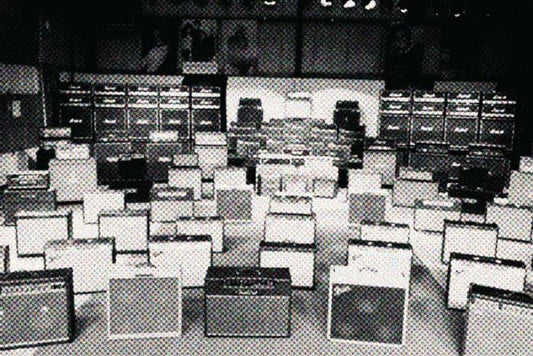 A picture of loads of guitar amps